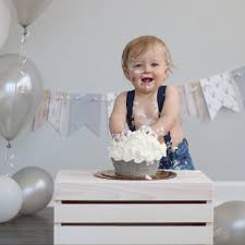 Meant for just the birthday boy or girl, these cakes are supposed to be smashed, eaten, crumbled, and otherwise destroyed by the child as part of the festivities or in a special photo shoot. Grey And White Simple And Neutral Cake Smash Smash Cake Photoshoot Smash Cake Boy Baby Boy Birthday Cake