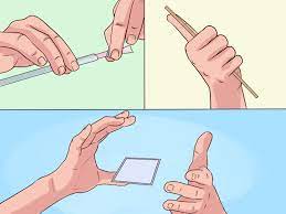 Learn how to make a playing card appear as if it levitates up off the palm of your hand. 3 Ways To Levitate A Card Wikihow