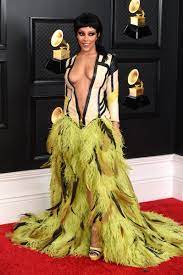 Doja cat was born amala ratna zandile dlamini on october 21, 1995 in los angeles, california to deborah elizabeth sawyer, a painter & dumisani dlamini, an actor. Doja Cat Makes A Daring Statement In Roberto Cavalli At 2021 Grammys Entertainment Tonight