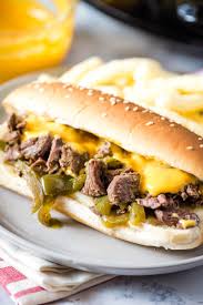 Arrange buns on a baking sheet, cut side up. Crock Pot Philly Cheesesteak Sandwich Adventures Of Mel