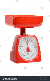 vintage red kitchen scales isolated on