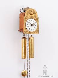 A miniature German Black Forest striking Sorg wall clock, circa 1840.