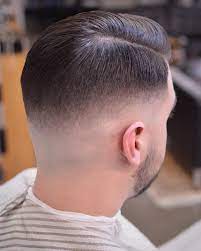 Parted Haircut Faded Down To Skin