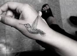 Bird Tattoo On Hand Meaning Hummingbird Tattoos For Hand Fashions Post Hand Tattoos Hummingbird Tattoo Black Hummingbird Tattoo