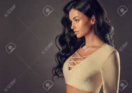 We are serious about our hair. Young Black Haired Woman With Voluminous Shiny And Wavy Hair Stock Photo Picture And Royalty Free Image Image 99050126