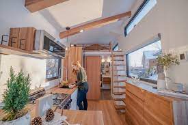 Classic white kitchen with wood floor, white cabinets & black countertops. Best 60 Modern Kitchen White Cabinets Medium Hardwood Floors Design Dwell