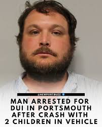 A Massachusetts man is facing DUI charges after striking a curb so hard it  disabled his vehicle Saturday night — with two young children inside.  Portsmouth Police say they responded to East