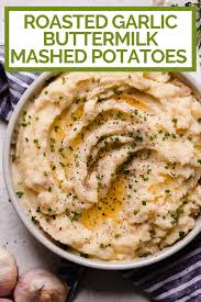 Roasted Garlic Buttermilk Mashed Potatoes Plays Well With Butter Recipe Buttermilk Mashed Potatoes Roasted Garlic Comfort Food Recipes Dinners