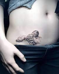 Baby Angel Based On The Pic Of Her Own Baby Girl Design By My Simmon Angel Tattoo For Women Baby Angel Tattoo Tattoos