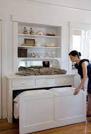 The legs automatically retract when the bed is folded away and extend as the bed is pulled down. Pin By Christine J Pace On Dream Home Guest Room Office Hidden Bed Home