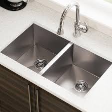 Undermount sinks are attached below the countertop, creating a flat, seamless appearance that will please those with more modern sensibilities. Ikea Bredsjon Under Glued Stainless Steel Apron Front Double Bowl Sink Artofit