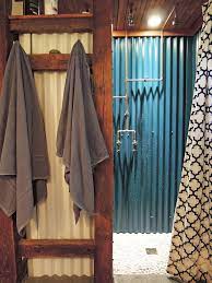 Enclosures can be made with almost anything, as long as you use a waterproof sealer, including bamboo, corrugated metal, sliding door, or simply a curtain. Custom Carpentry Bathroom Shower Stalls Rustic Shower Tin Shower Walls