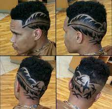 This One Here Is Phenomenal Shaved Head Designs Celebrity Tattoos Mens Hairstyles