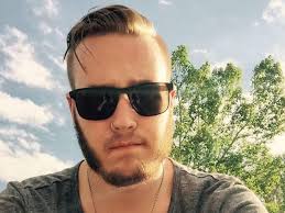 Calgary taxi driver suspended for kicking out gay man and calling him  'disgusting' for kissing