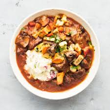 A Rich And Meaty Beef Stew Made In The Traditional Boeuf Bourguignon Style With Bacon Cremini Mushrooms And Roasted Rutabaga Beef Buttermilk Mashed Potatoes