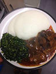Special African Meal Sadza Oxtail Stew And Green Fried Vegetables Oxtail Recipes African Food African Cooking