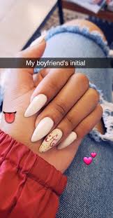 Initial On White Gel Acrylic White Gel Nails Fire Nails Coffin Nails Designs One of our favorites is coffin shaped nails.