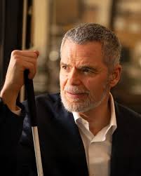 Shane Snyder '89 turned a personal challenge into a mission to help others  thrive. As director of programs at the Society for the Blind, he leads  programs that help people regain independence