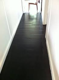I Love These Black Wood Floors I Could Find Some Cheap Flooring Sand It And Stain It Matte Black Painted Wood Floors Black Wood Floors Painted Hardwood Floors