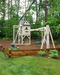 My backyard looks really really good now. How To Install A Swing Set On Uneven Ground Or A Hill