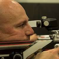 U.S. Marine Corps Gunnery Sgt. Douglas Godfrey aims
