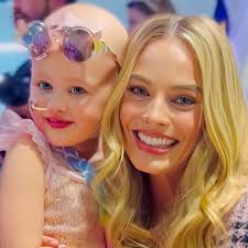 Margot Robbie: Barbie star visits kids at Sydney Children's hospital and  meets four-year-old fan