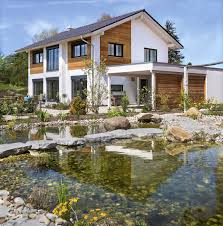 Die unterkunft das haus am teich wurde im juni 2014 eröffnet. Garten Inspiration Mit Teich Von Regnauer Hausbau Alles Infos Zum Haus Mit Einem Klick Auf Das Bild Erhalten Fertig Fassade Haus Haus Verputzen Haus Bauen