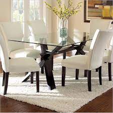 It features a spacious rectangular tabletop that can accommodate up to six chairs with ease. Steve Silver Company Berkley Dining Table In Espresso With Clear Glass Top Be500gt Be50 Glass Top Dining Table Dining Room Table Set Dining Room Contemporary