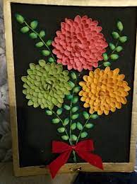A Bouquet Of Flowers Made Of Pista Shells Shell Crafts Diy Pista Shell Crafts Shell Crafts
