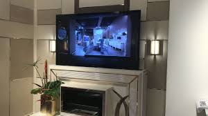 tv lift cabinets that disguise your