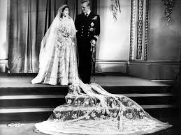 Prince philip designed elizabeth's ring with his mother's diamonds. 15 Queen Elizabeth Wedding Pictures Details You Didn T Know
