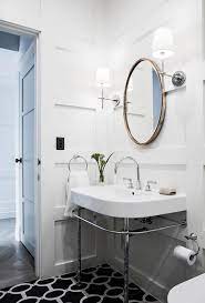 15 Bathroom Lighting Ideas That Pair Form With Function Bathroom Light Fixtures Bathroom Lighting Bathroom Mirror