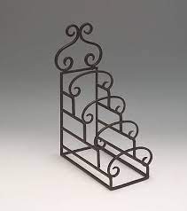 Electric table display stands an innovated way to light up and display stained glass or fused projects. Plate Stands Wrought Iron Four Tiered Set Of 4 Plate Easels And Stands