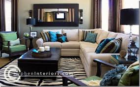 I Like The Dark Brown Throughout This Room And The Pops Of Bold Colors Brown Living Room Decor Blue And Green Living Room Family Room