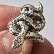 The Highly Carved Snake Design Makes This Ring A True Statement Piece Finely Carved Details Can Be Found Thro Silver Metal Clay Snake Design Snake Ring Silver