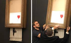 Art prankster banksy shredded a framed canvas at a london auction on oct. 1 3m Banksy Artwork Self Destructs At Auction
