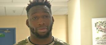 New Bedford native, NFL's Jordan Todman visits GNB Voc Tech