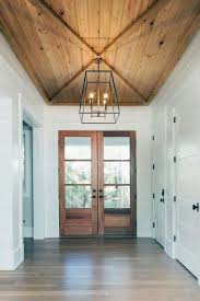 Pin By Davin Jung On Ceiling Beams And Door Posts Foyer Lighting High Ceiling Modern Foyer Wood Doors Interior