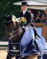 Animal lover, dressagerider, mother, author, businesswoman & enjoying aplant based diet. Strahlende Siegerin Der Grand Prix Kur Der Nurnberger Versicherung Cdi5 Jessica Von Bredow Werndl Und Tsf Dalera Bb
