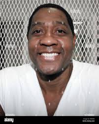 Texas death row inmate Eric Cathey poses in the interview cage at the Texas  Department of Criminal Justice Polunsky Unit, in Livingston, Texas,  Wednesday, Nov. 5, 2008. Cathey is scheduled for execution