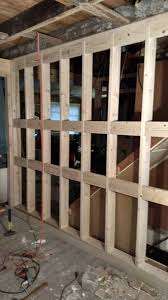 The Old Butchered Up Wall That Separated The Kitchen From The Stairwell Has Been Torn Out Rebuilt Has Cabinet Blo New Staircase House Interior Renovations