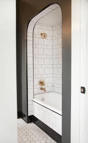 Alcove soaking, whirlpool & air tubs. Black And White Bathroom With Arched Bathtub Alcove Transitional Bathroom