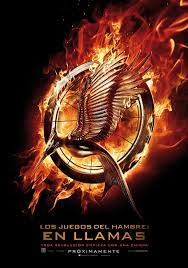 Poster En Espanol De Los Juegos Del Hambre En Llamas Los Juegos Del Hambre Juegos Del Hambre Trilogia De Juegos Del Hambre