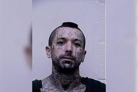 Wanted Maryland man with slew of face tattoos fled from officers