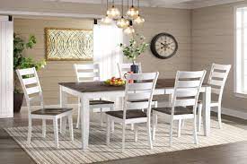 A contrasting white and honey oak. Kodi Solid Wood Dining Table At Gardner White