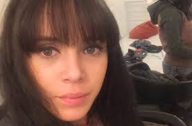 Woman kicked police officer 'when he threw her