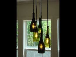 Perhaps substitute a glass bottle for a plastic bottle for safety around the kiddos. 18 Homemade Beer Bottle Chandelier Ideas You Can Diy Easily In 2021 Bottle Chandelier Wine Bottle Chandelier Diy Wine Glass