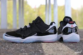 Black And White 11 Jordans Release Date Detailed On Foot Photos Of The Infrared Air Jordan 11 Low Air Jordans Air Jordans Retro Nike Shoes Jordans