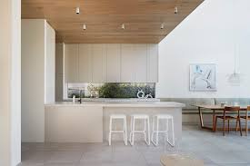 Pipkorn & kilpatrick cleverly rearranged the original garage into a combined pool house & double garage with mezzanine storage. Kate Patterson Landscapes Archdaily