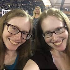 Twin Siblings Competing in Wrestling Matches